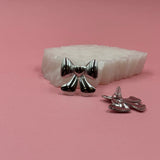 Bow silver earrings