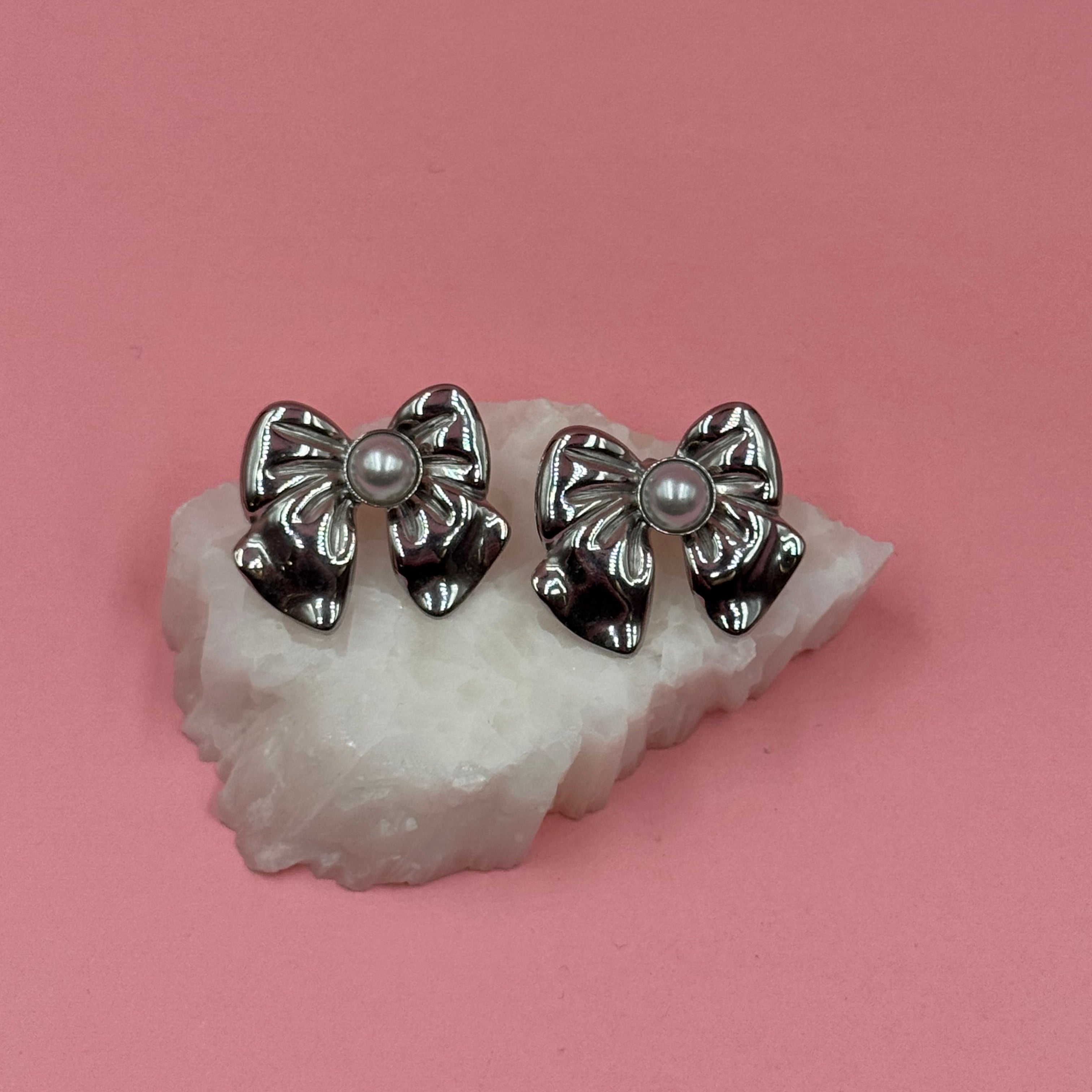 Pearl bow silver earrings