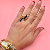 Black flowers gold ring